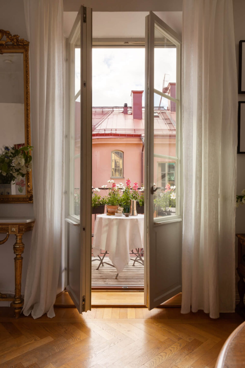 Antiques and Modern Additions in a Cozy Top Floor Duplex Apartment 7 glass balcony doors