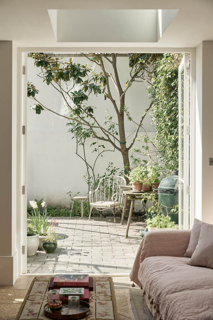 Light-Filled Interiors in a Grand Early Victorian House in Notting Hill 9 glass doors to garden