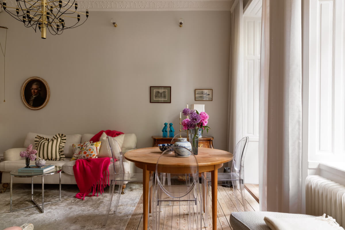 A Classic Late 19th-Century Apartment with a Private Courtyard Terrace 6 gray living room dining table with clear chiars