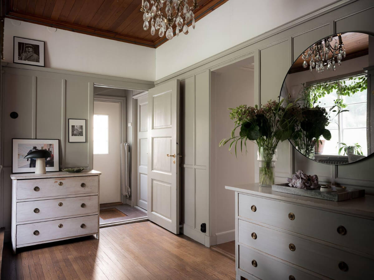 A Floral Painted Ceiling in a 1920s Family Home in Sweden 19 gray paneled walls hallway