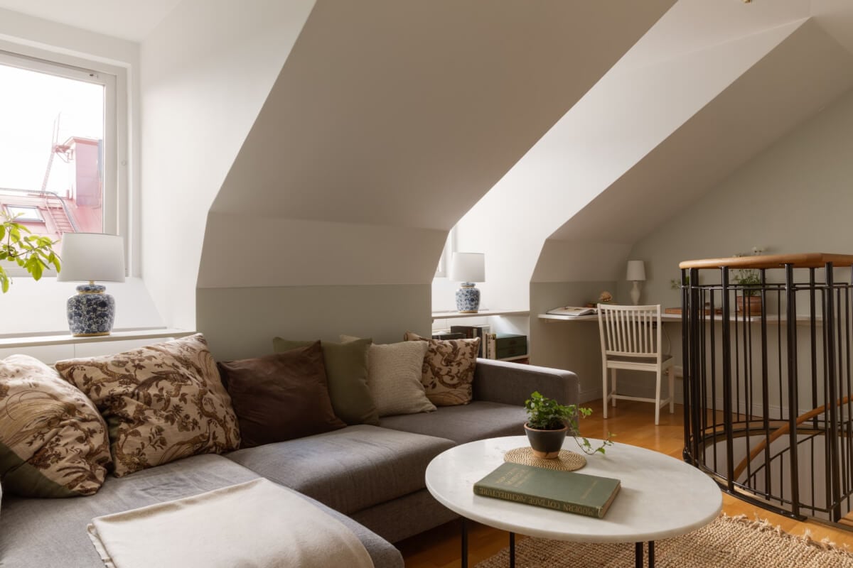 Antiques and Modern Additions in a Cozy Top Floor Duplex Apartment 19 gray sofa attic living room
