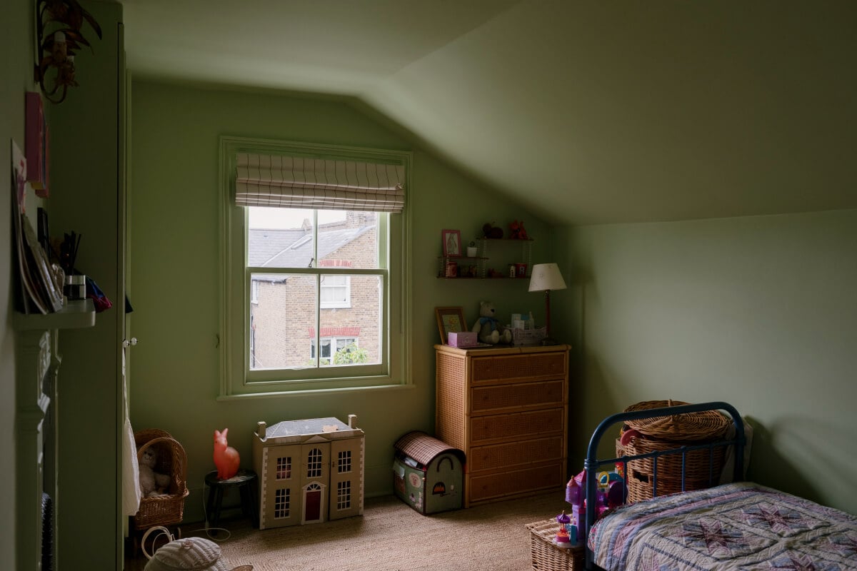 A Victorian Family House with a Tuscan-Inspired Kitchen Extension 29 green bedroom slanted ceiling