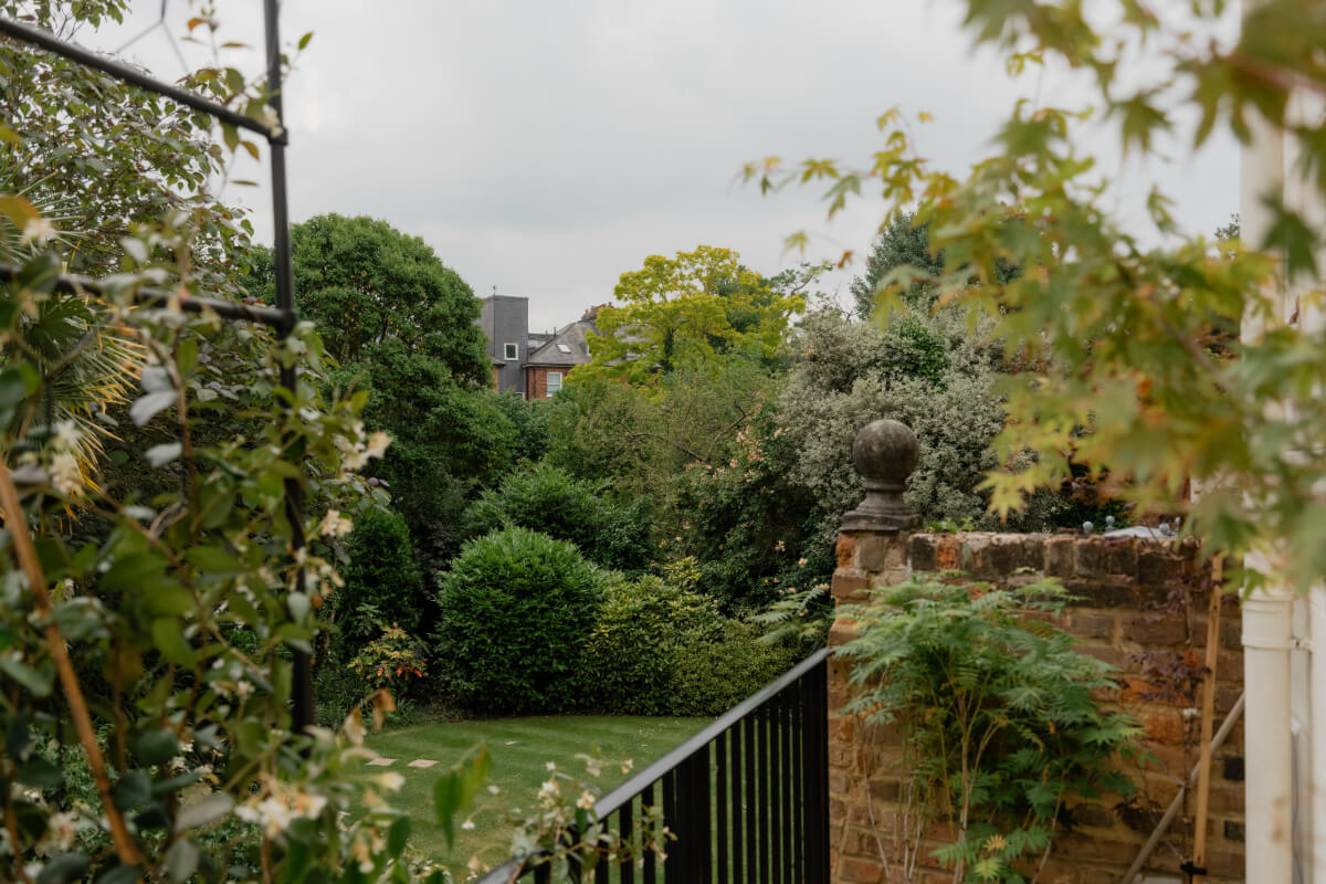 High Ceilings and Bespoke Design in a Stylish London Apartment 19 green communal garden