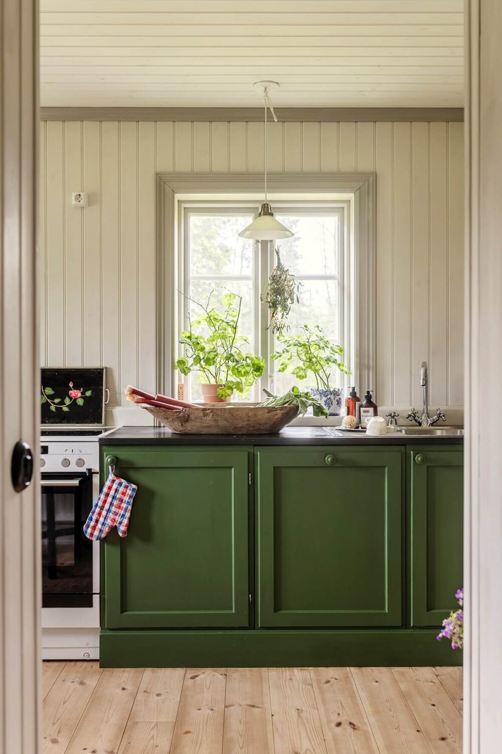 A Beautifully Preserved Historic Country House in Sweden 9 green country house kitchen