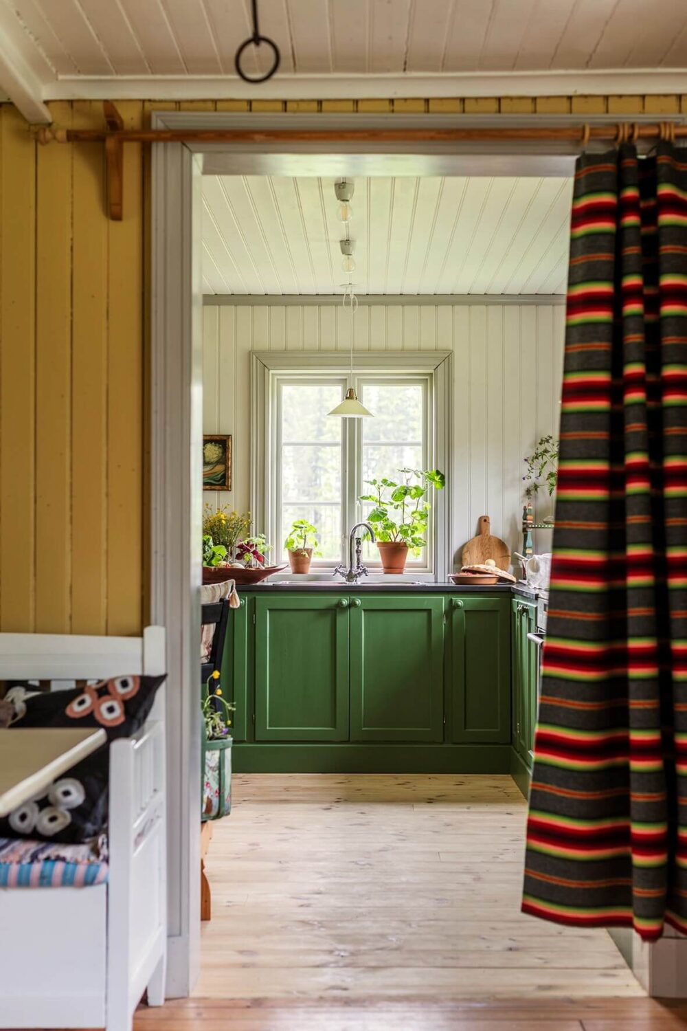 A Beautifully Preserved Historic Country House in Sweden 11 green kitchen