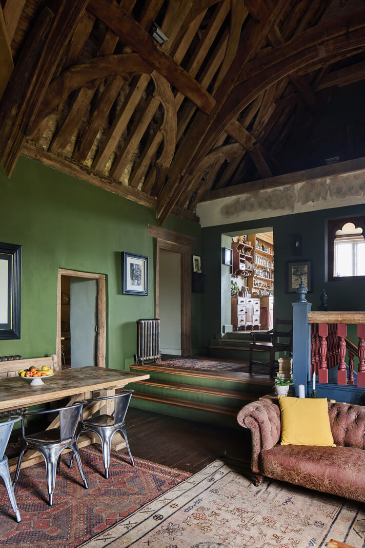 Unique Rooms and Historic Splendor in a Medieval English Country House 10 green living space large wooden table timber ceiling