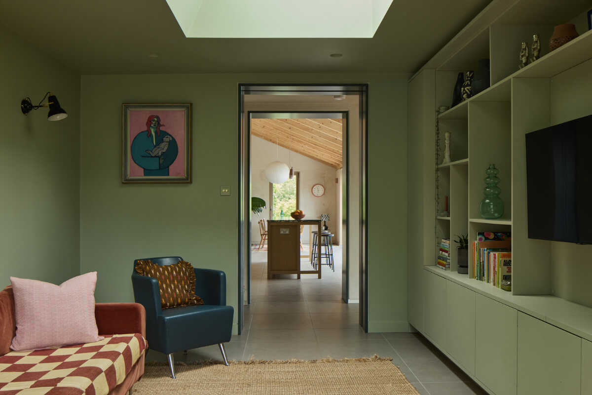 A Modern Bungalow with a Terrazzo Kitchen and Magnificent Views 9 green television room