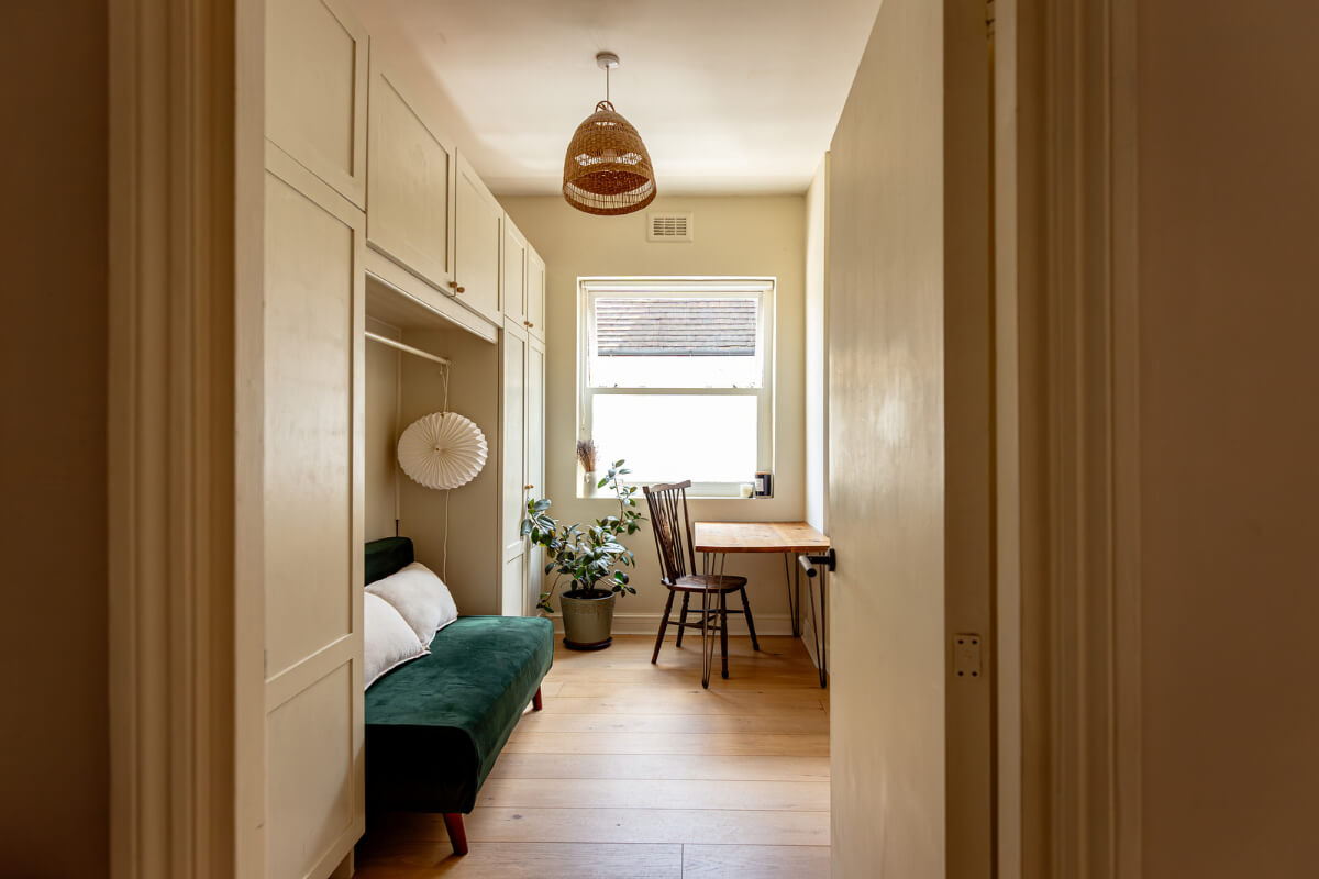 Muted Gray Tones and Built-In Storage in a London Apartment 18 guest bedroom home office