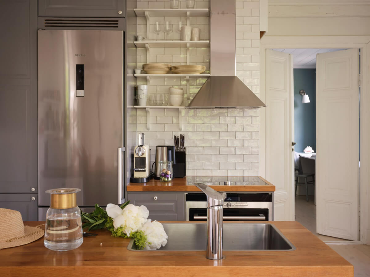 This Extended 19th Century Lakeside House is a Green Oasis in the City 34 guest house kitchen