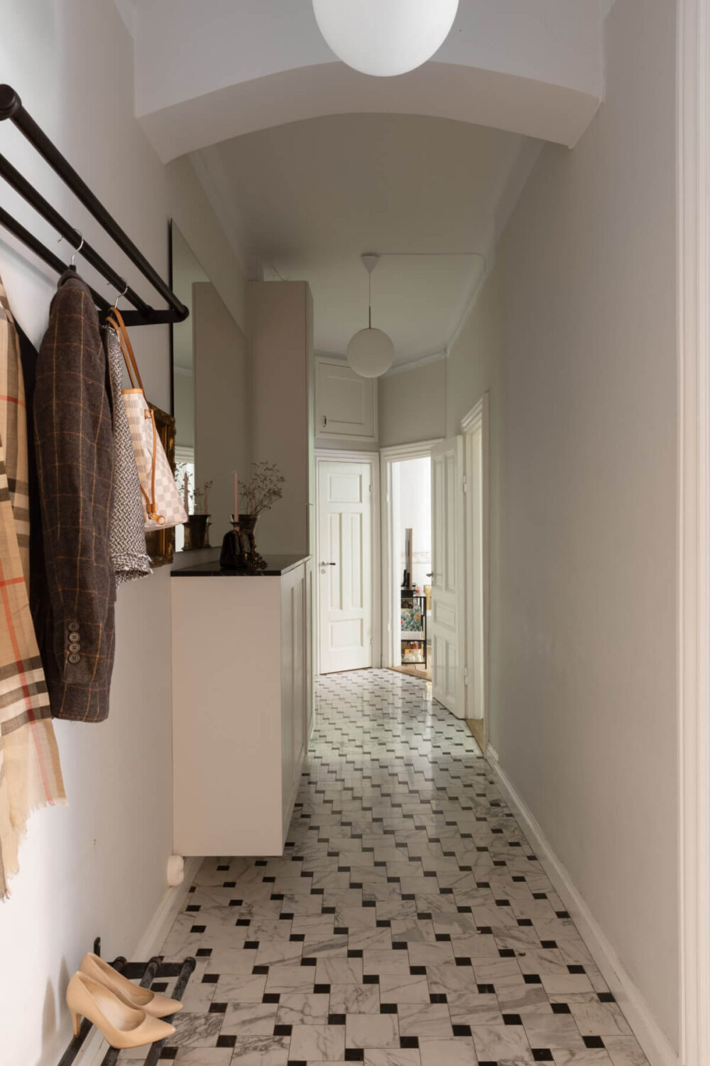 A Classic Late 19th-Century Apartment with a Private Courtyard Terrace 22 hall marble tiles A Classic Late 19th-Century Apartment with a Private Courtyard Terrace