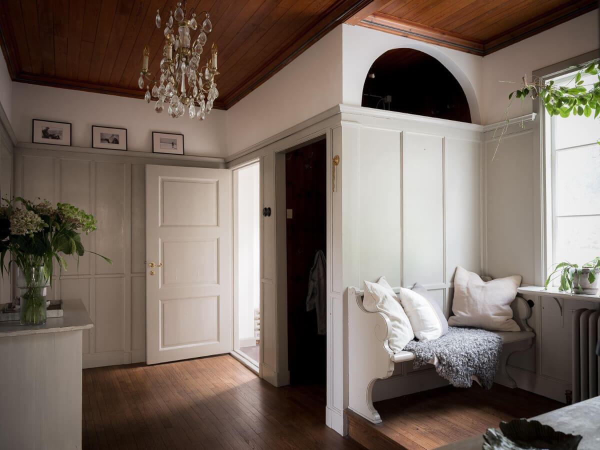 A Floral Painted Ceiling in a 1920s Family Home in Sweden 17 hall paneled walls dark wooden ceiling