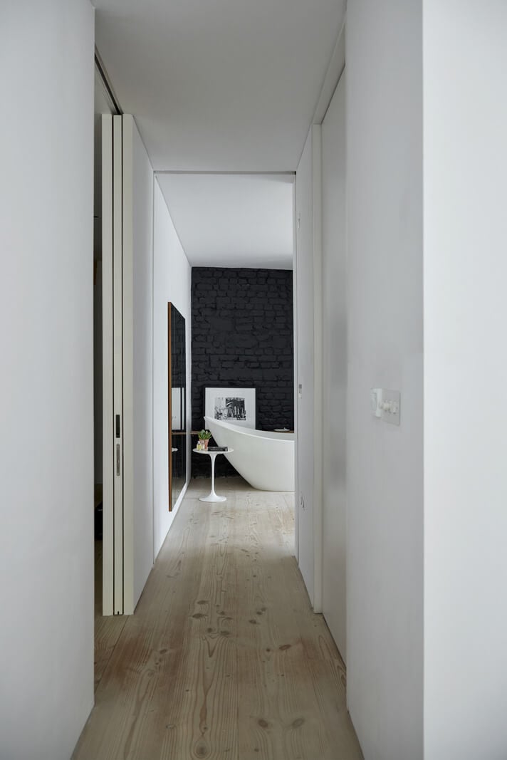 A Black and White Primrose Hill Mews House with a Roof Terrace 12 hall view into bathroom