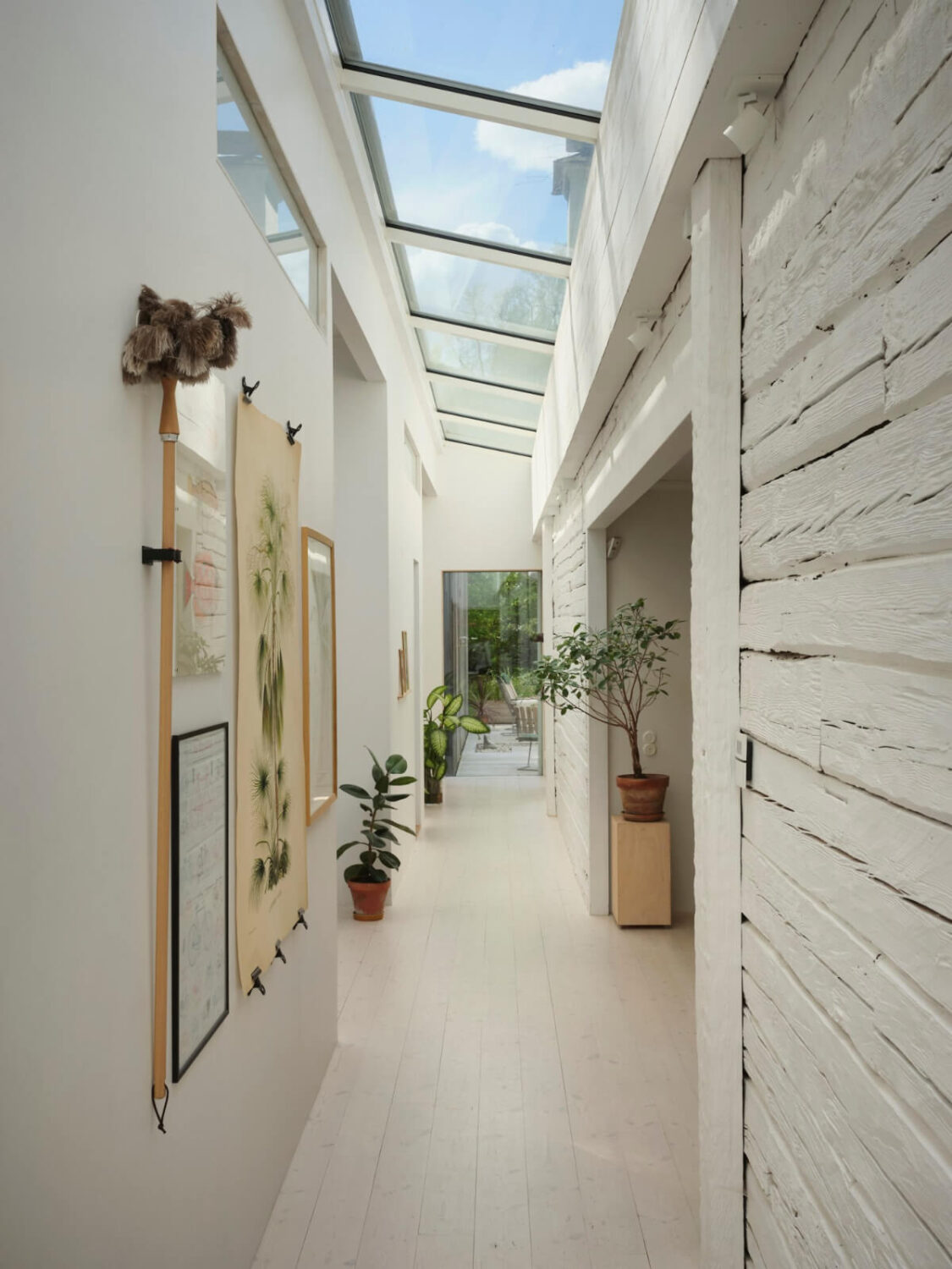 This Extended 19th Century Lakeside House is a Green Oasis in the City 15 hall white floor skylights