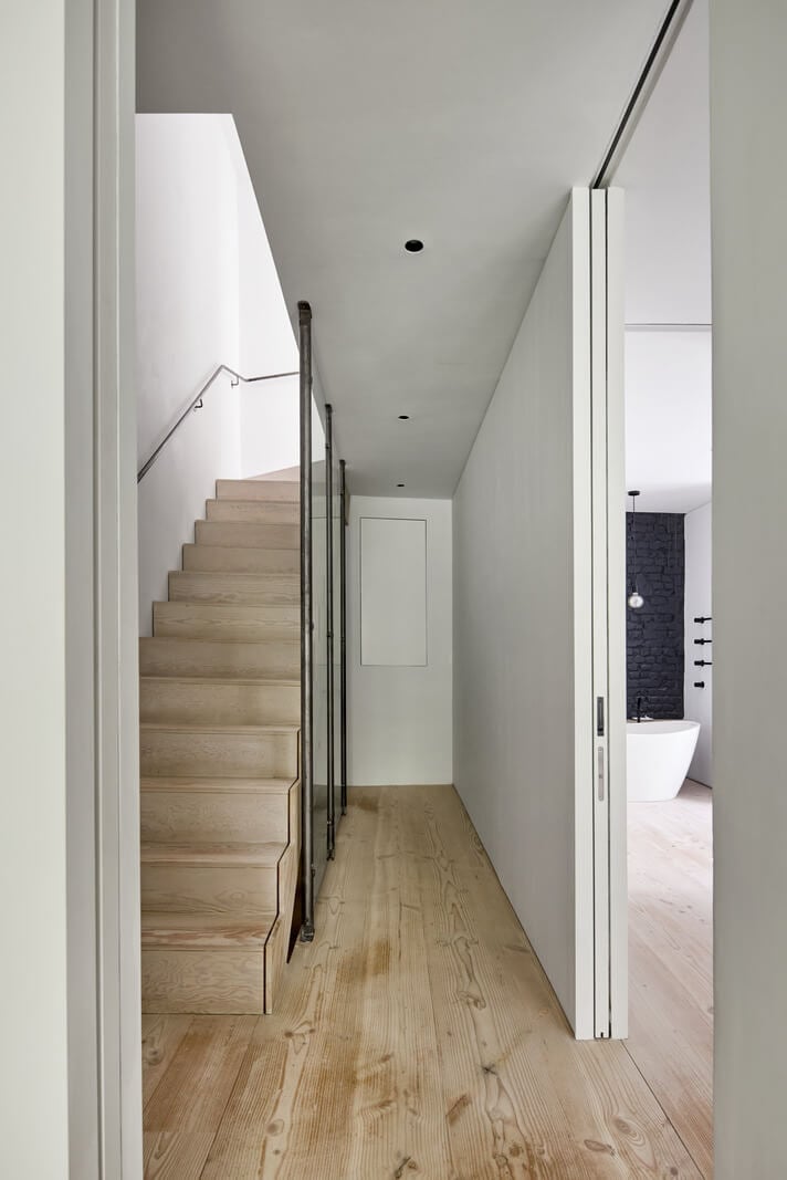 A Black and White Primrose Hill Mews House with a Roof Terrace 9 hall wooden floor