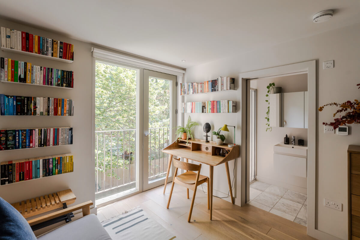 A High-Pitched Ceiling In a Light London Duplex Apartment 12 home office wooden desk
