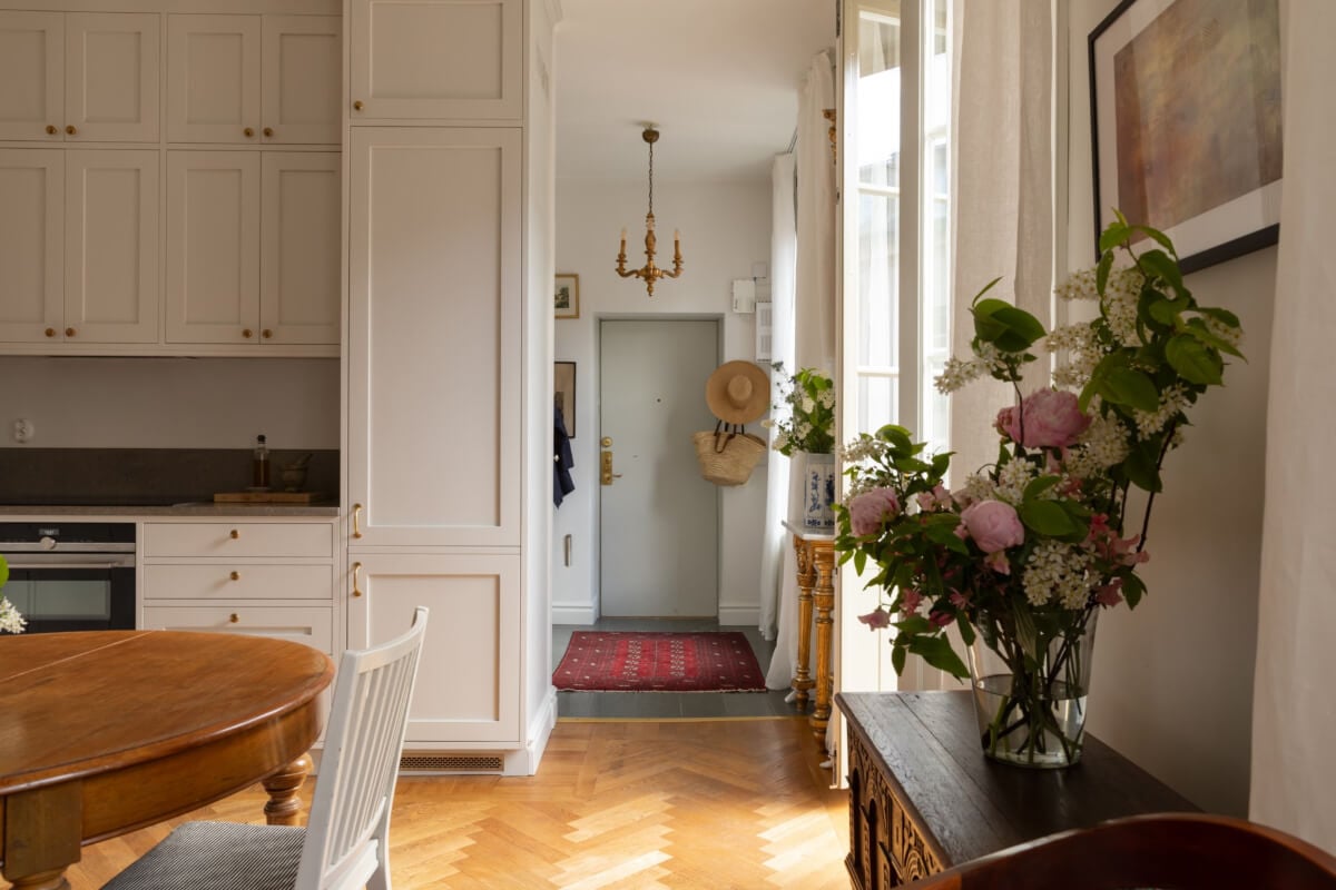 Antiques and Modern Additions in a Cozy Top Floor Duplex Apartment 12 kitchen antique round table