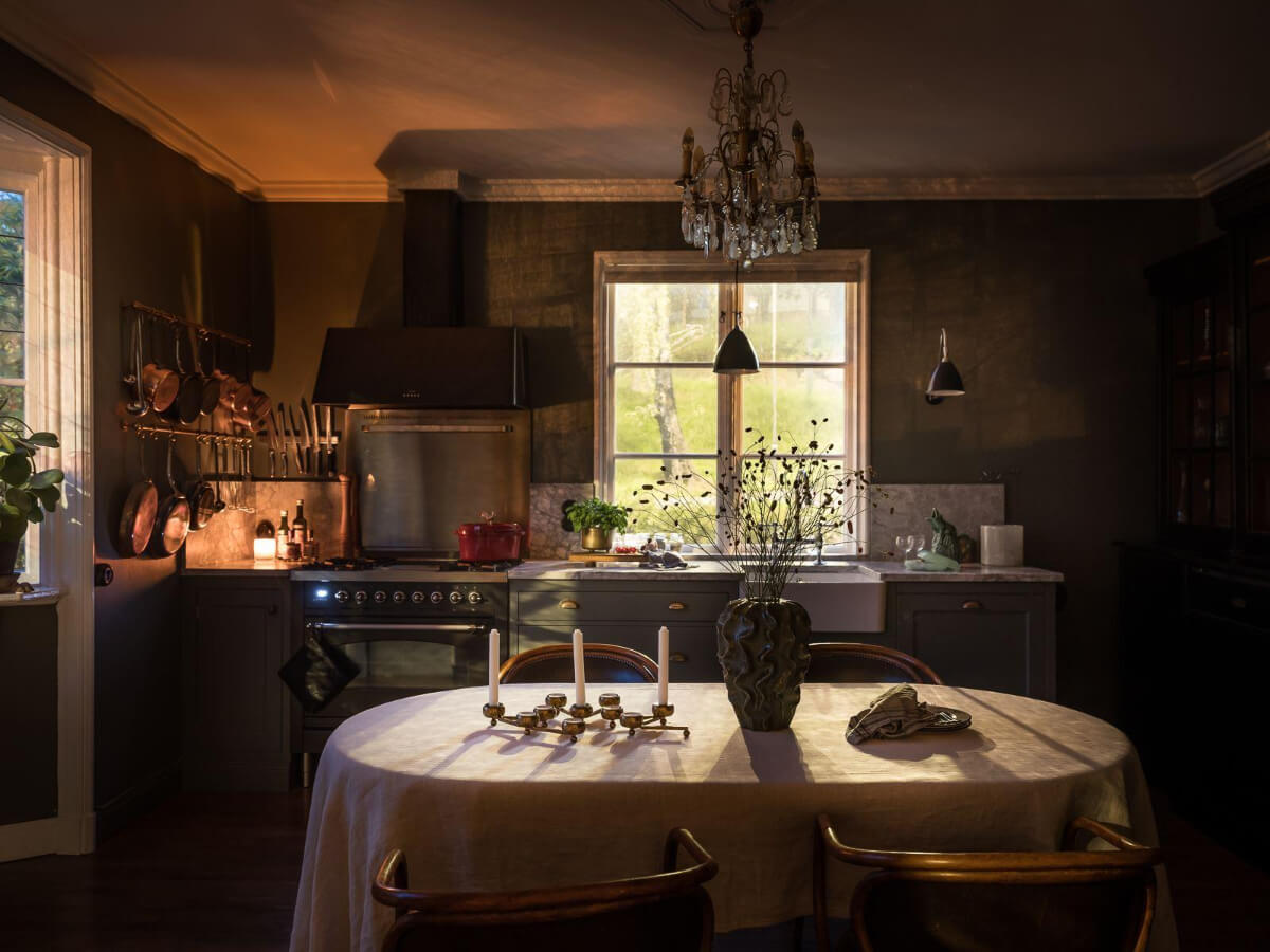 A Floral Painted Ceiling in a 1920s Family Home in Sweden 15 kitchen at night