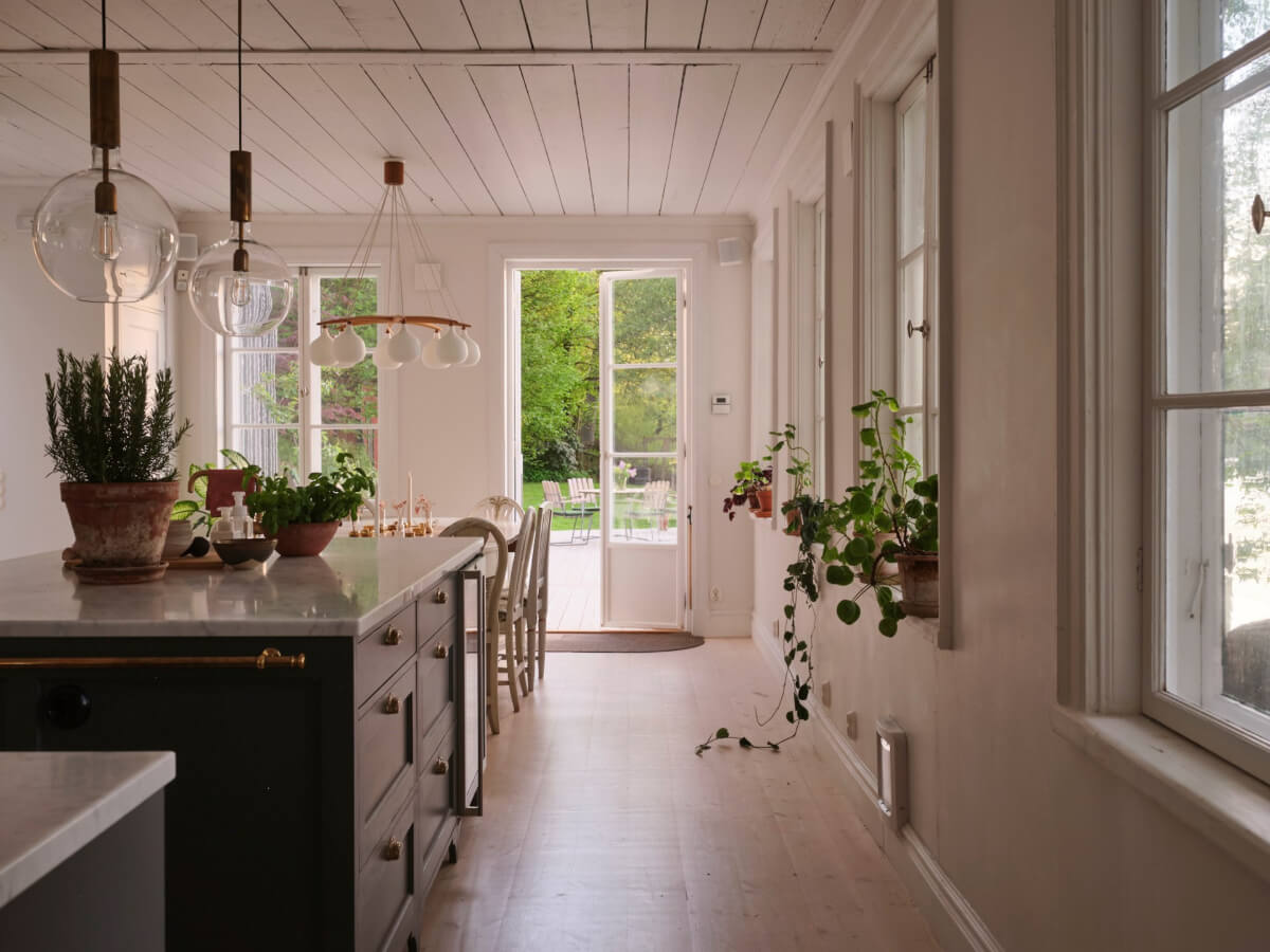 This Extended 19th Century Lakeside House is a Green Oasis in the City 9 kitchen dining room