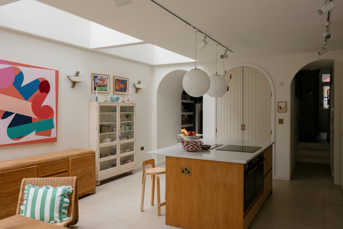 A Victorian Family House with a Tuscan-Inspired Kitchen Extension 18 kitchen island arched built in cabinets A Victorian Family House with a Tuscan-Inspired Kitchen Extension