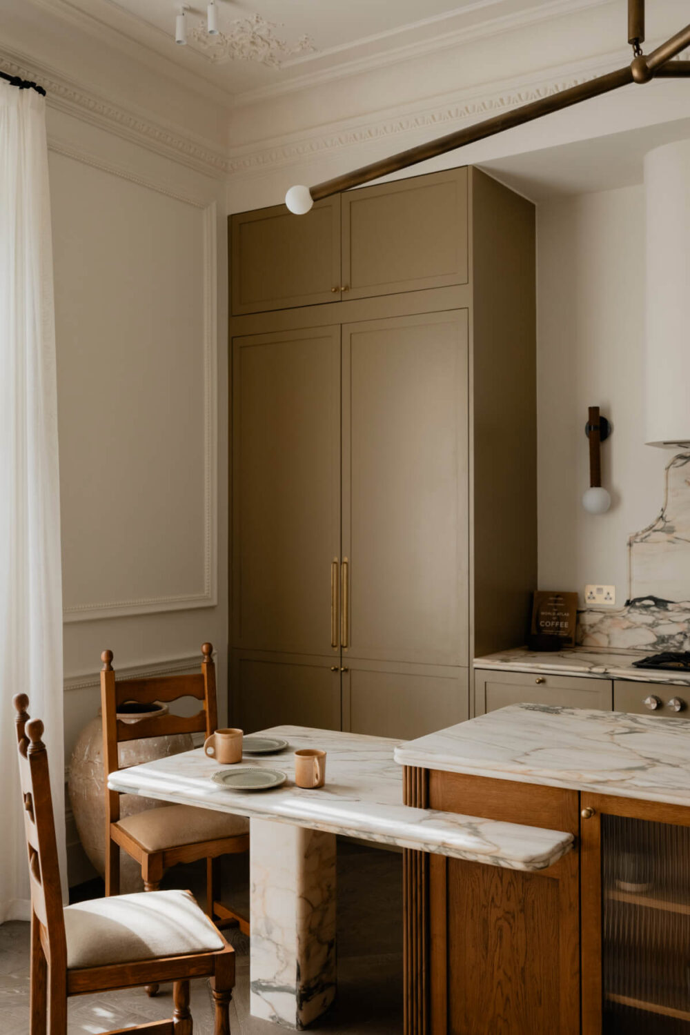 High Ceilings and Bespoke Design in a Stylish London Apartment 13 kitchen island with marble dining spot