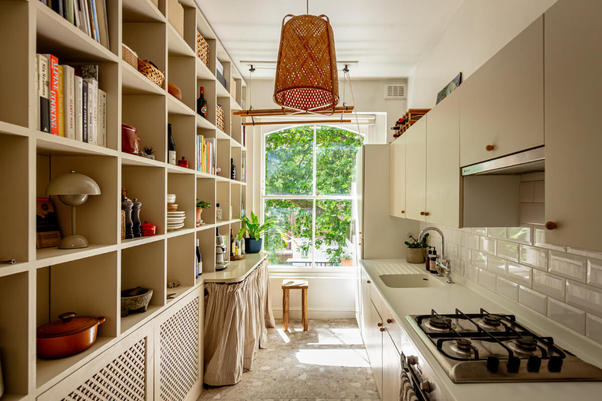 Muted Gray Tones and Built-In Storage in a London Apartment 7 kitchen terrazzo floor built-in cabinets