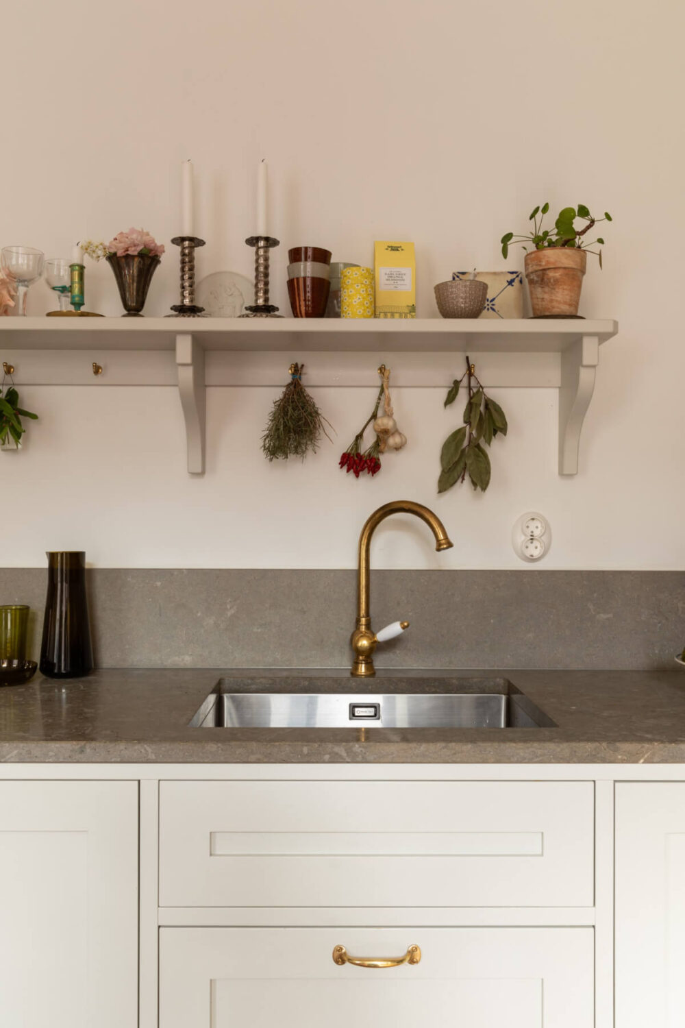 Antiques and Modern Additions in a Cozy Top Floor Duplex Apartment 15 kitchen-with-display-shelf