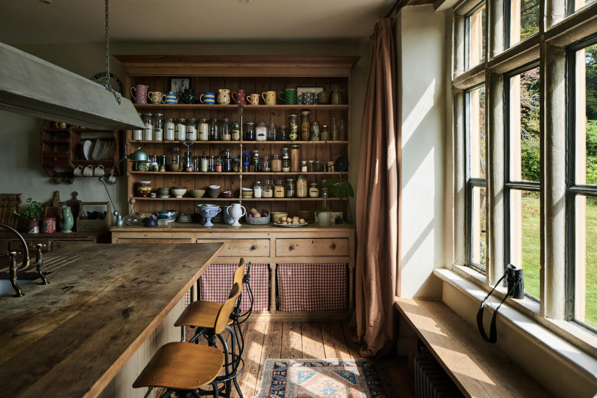 Unique Rooms and Historic Splendor in a Medieval English Country House 13 kitchen with island and wooden cabinet