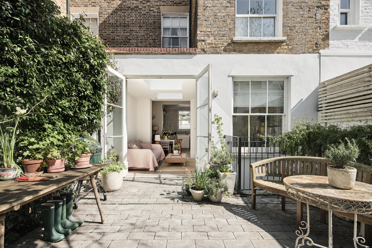 Light-Filled Interiors in a Grand Early Victorian House in Notting Hill 13 large glass doors