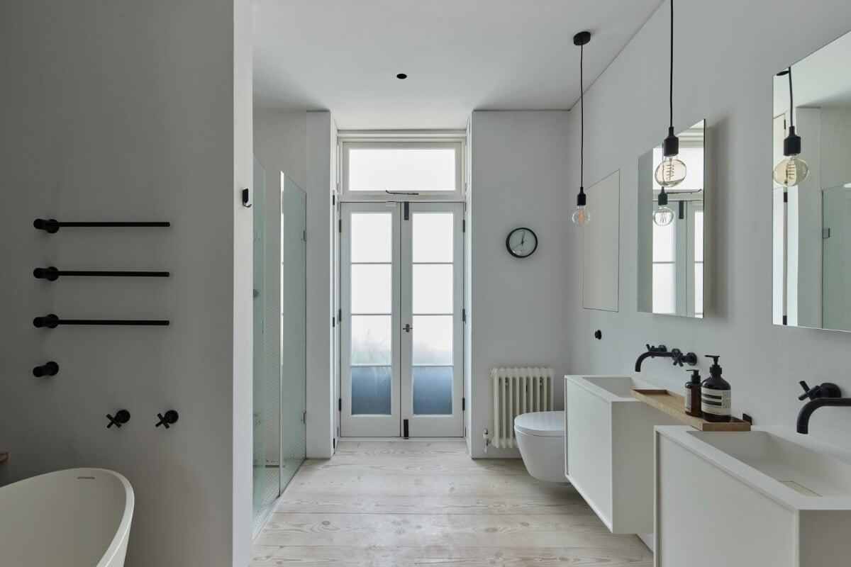 A Black and White Primrose Hill Mews House with a Roof Terrace 13 large white bathroom wooden floor
