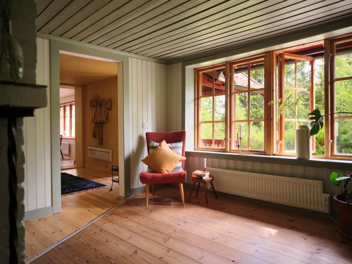 A Charming, Extended 19th-Century Log House in Sweden 20 large windows