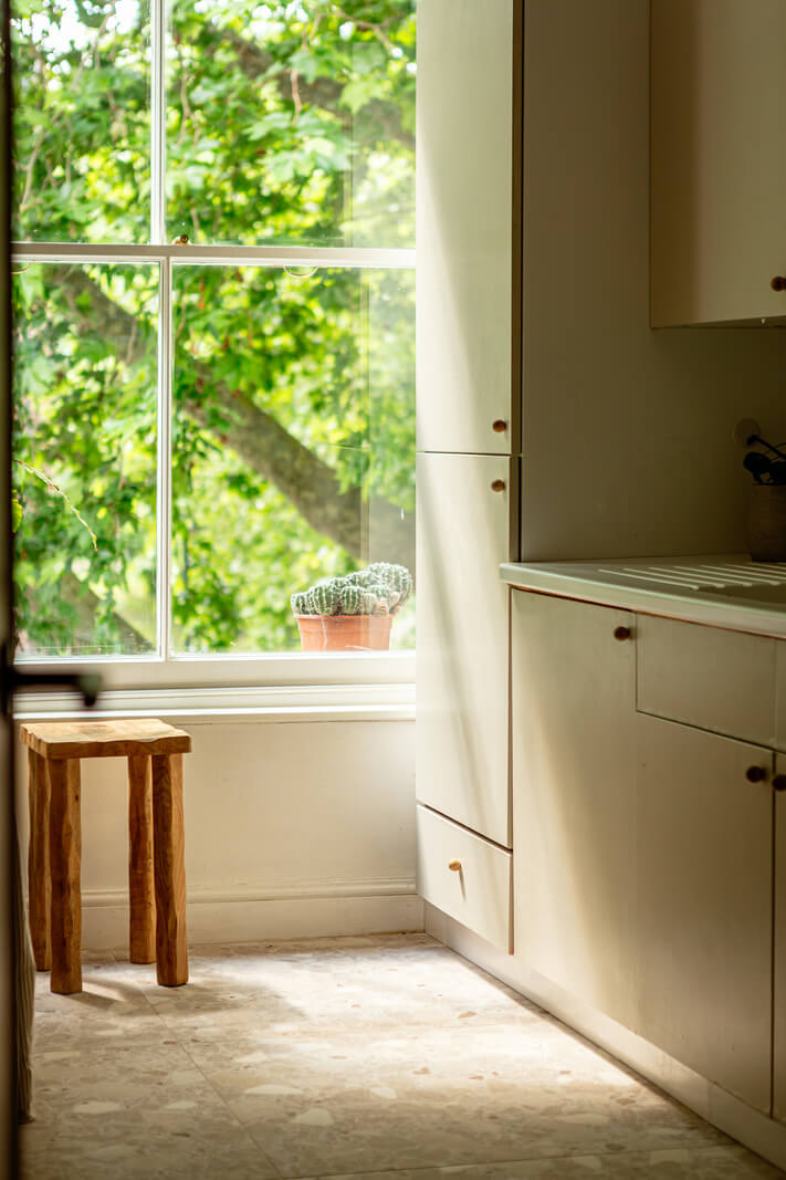 Muted Gray Tones and Built-In Storage in a London Apartment 11 large windows