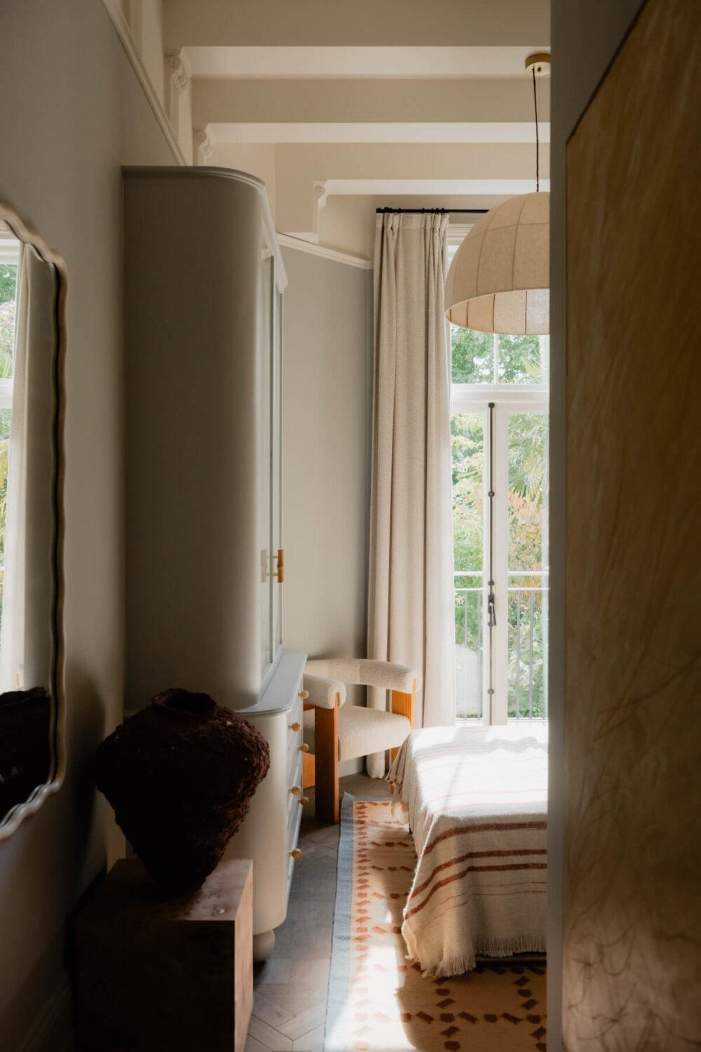 High Ceilings and Bespoke Design in a Stylish London Apartment 33 light bedroom curved wardrobes