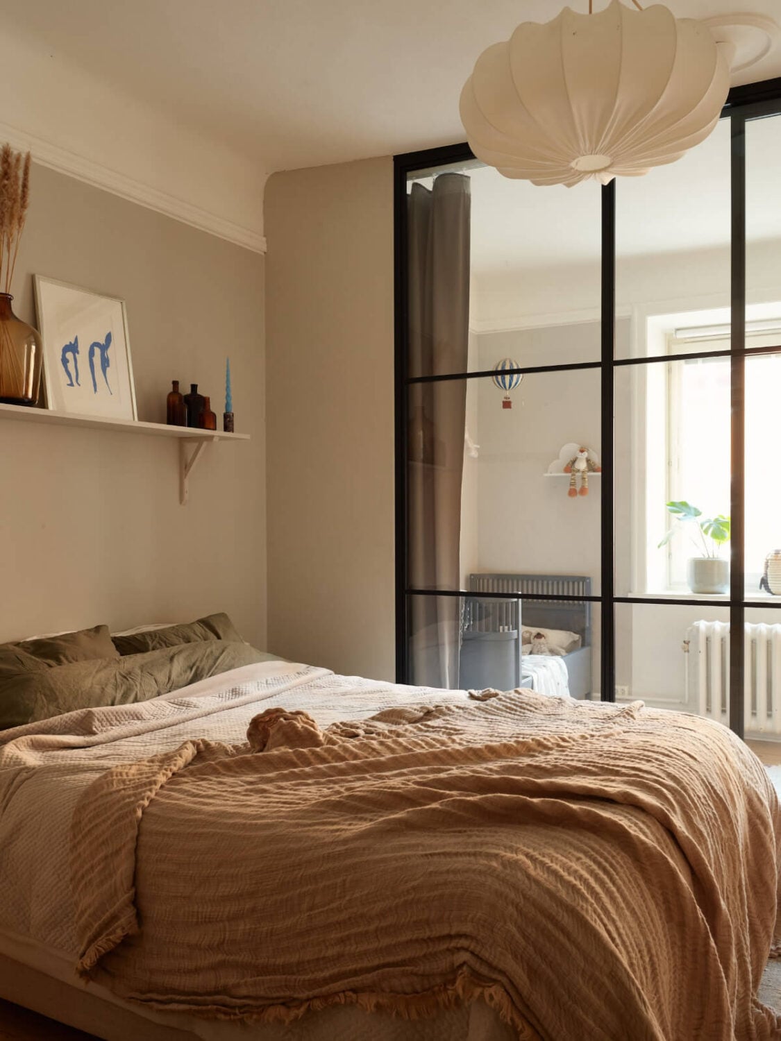 Historic Charm and an Industrial Glass Wall in a Stockholm Apartment 17 light gray bedroom industrial glass wall
