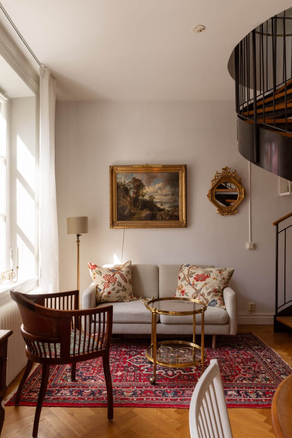 Antiques and Modern Additions in a Cozy Top Floor Duplex Apartment 4 living room antique art herringbone parquet floor