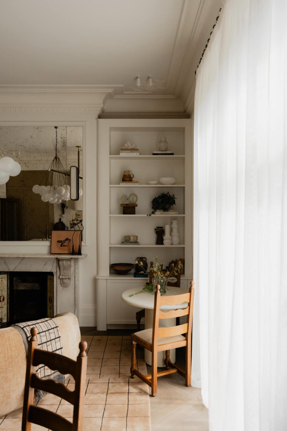 High Ceilings and Bespoke Design in a Stylish London Apartment 3 living room bookshelves