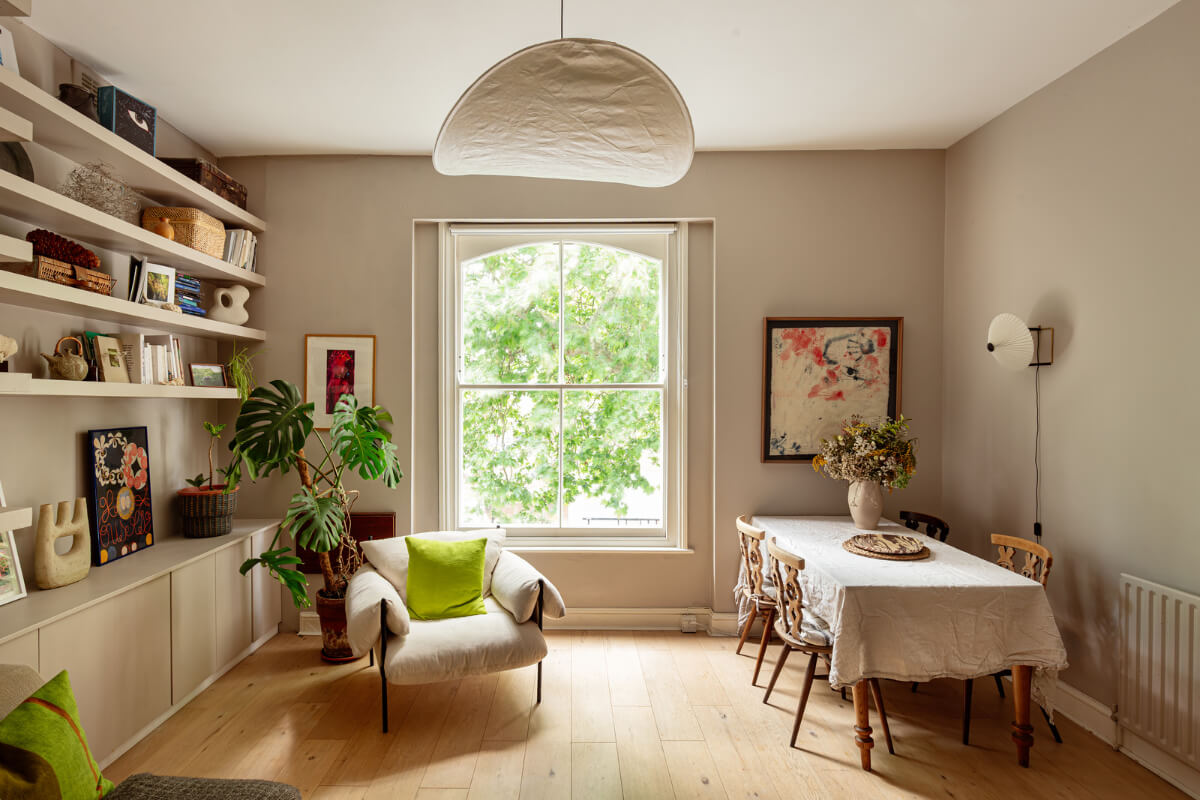 Muted Gray Tones and Built-In Storage in a London Apartment 4 living room bookshelves