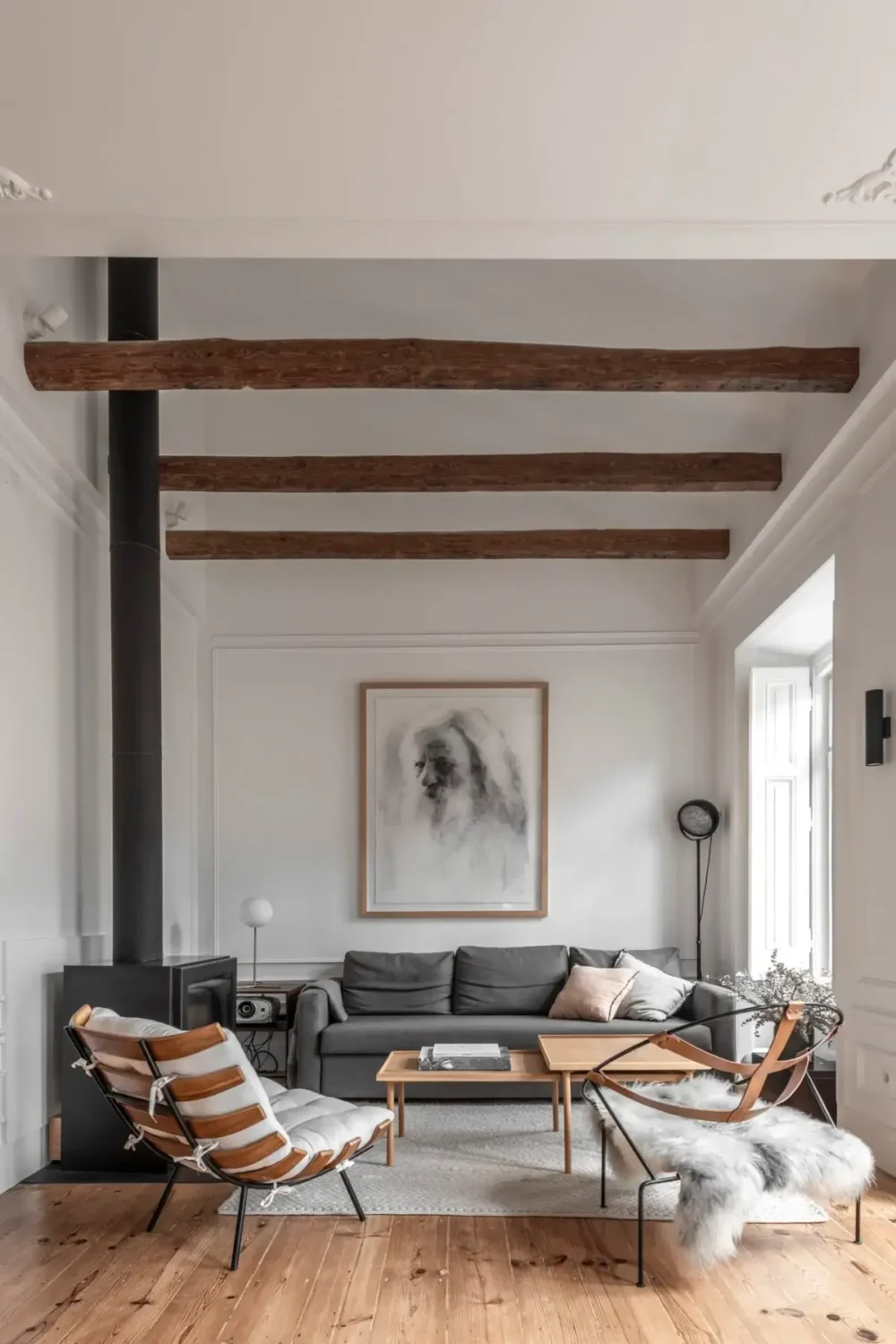 A Light-Filled Duplex Apartment in a Classical Lisbon Building 2 living room exposed wooden beams
