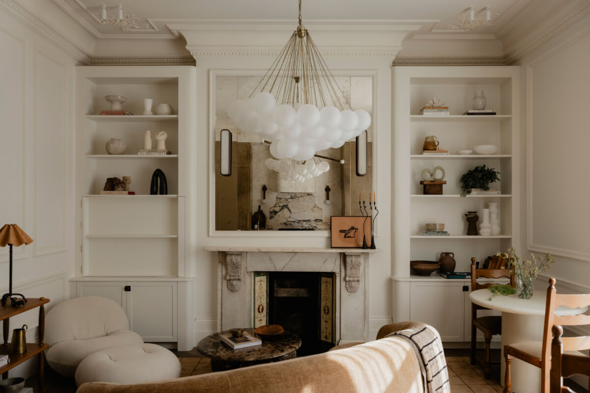 High Ceilings and Bespoke Design in a Stylish London Apartment 2 living room fireplace curved sofa