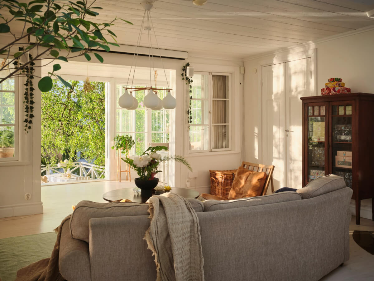 This Extended 19th Century Lakeside House is a Green Oasis in the City 4 living room lakeside doors