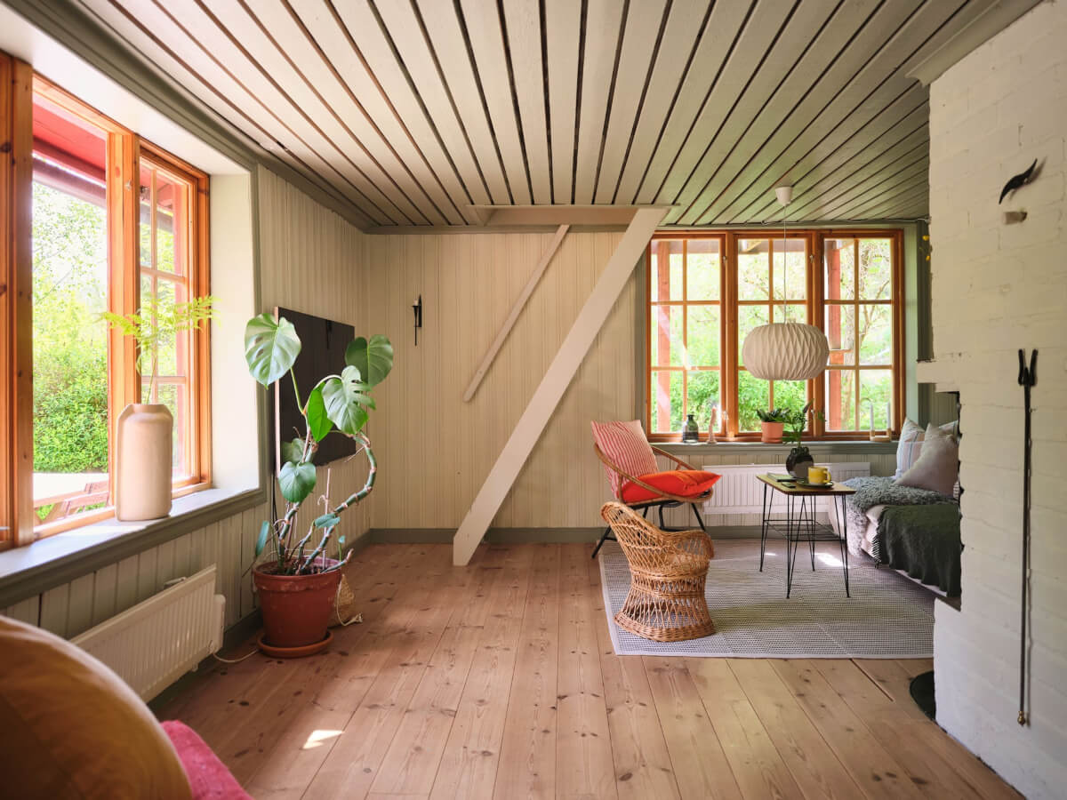 A Charming, Extended 19th-Century Log House in Sweden 23 living room large windows
