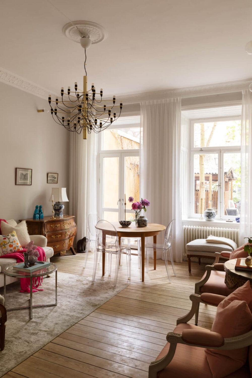 A Classic Late 19th-Century Apartment with a Private Courtyard Terrace 2 living room light gray walls wooden floor