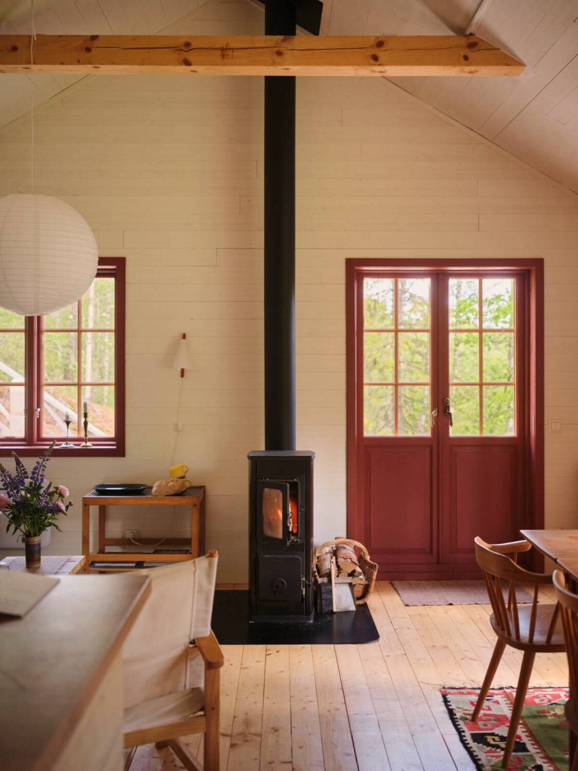 A Charming, Extended 19th-Century Log House in Sweden 6 living room log burner