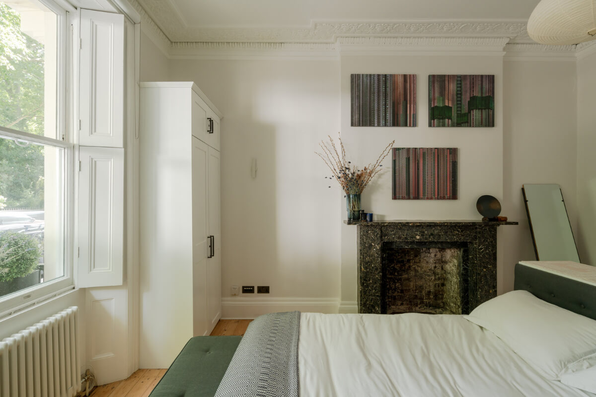 Historic Charm and Modern Design in a Light-Filled Pimlico Apartment 17 master bedroom fireplace large windows
