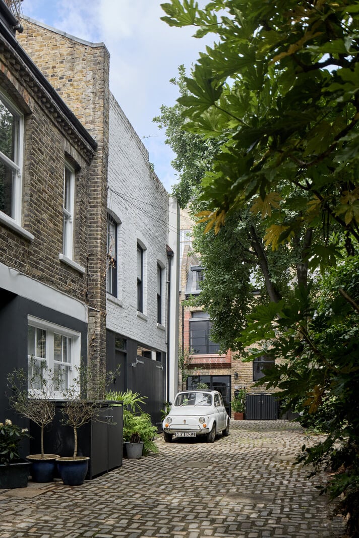 A Black and White Primrose Hill Mews House with a Roof Terrace 30 mews house cobbled street