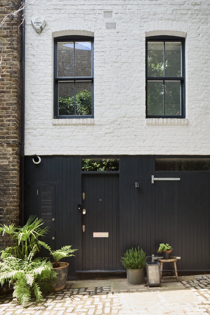 A Black and White Primrose Hill Mews House with a Roof Terrace 29 mews house front door