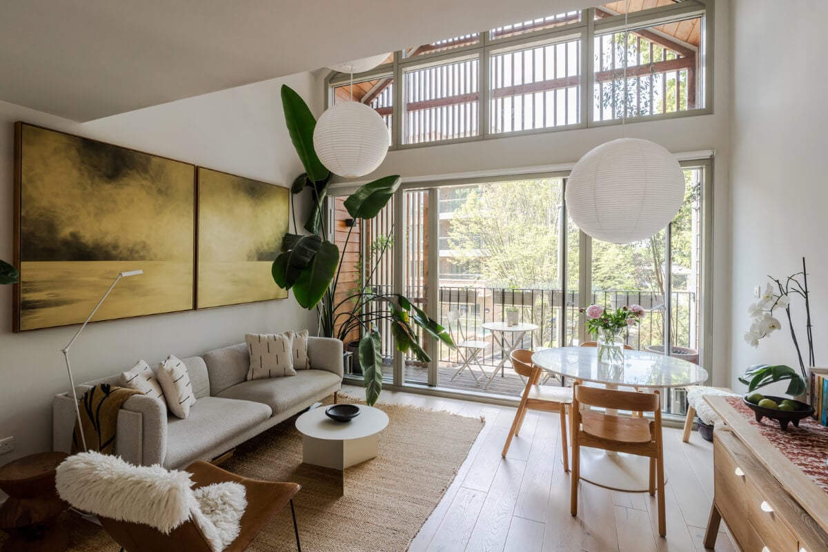 A High-Pitched Ceiling In a Light London Duplex Apartment 5 modern living room large windows high pitched ceiling