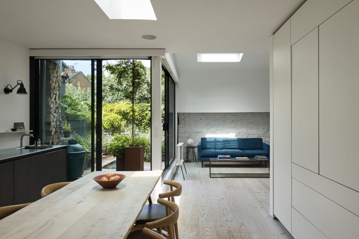 A Black and White Primrose Hill Mews House with a Roof Terrace 4 open-plan living space black kitchen