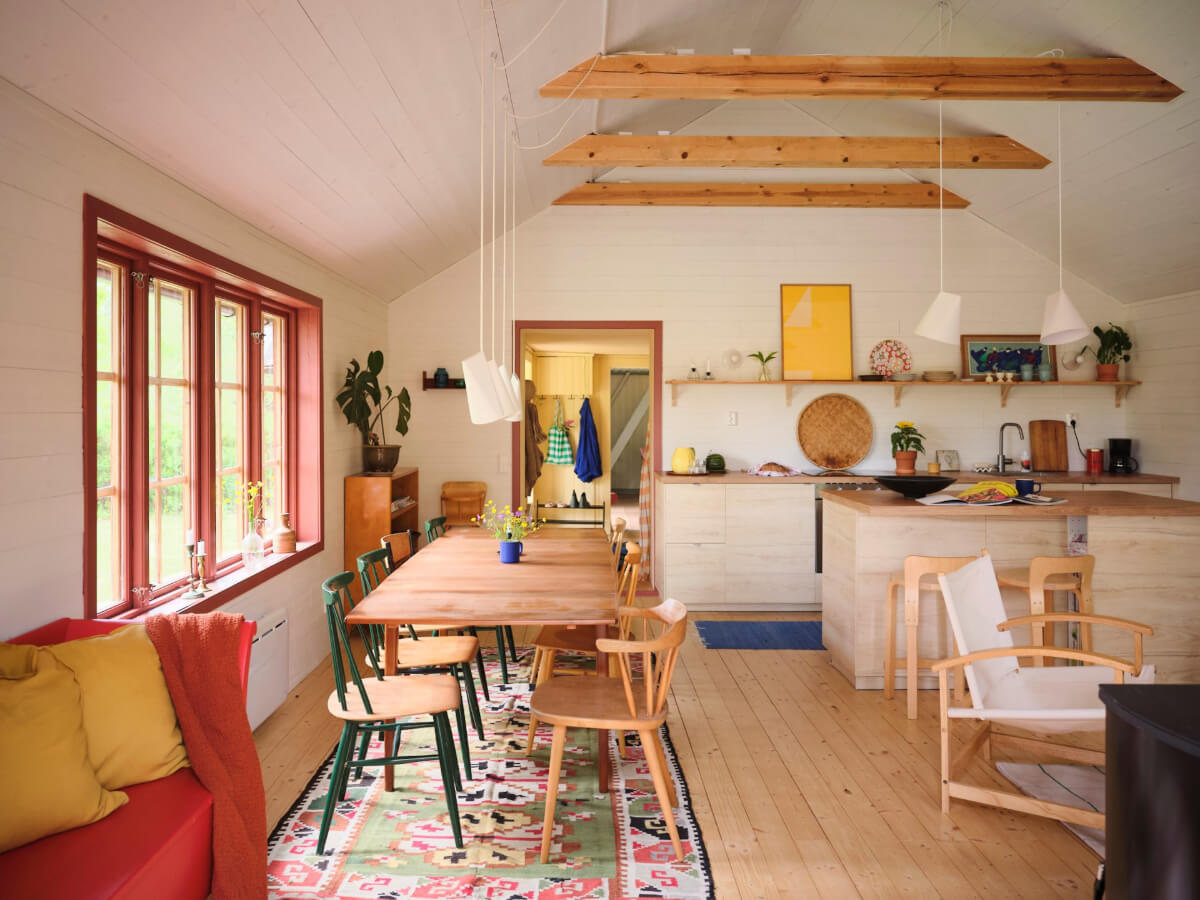 A Charming, Extended 19th-Century Log House in Sweden 1 open-plan living space high pitched ceilings wooden beams