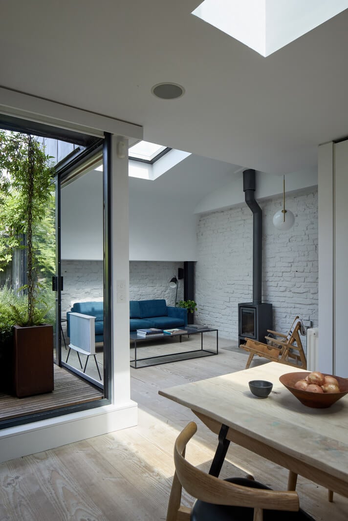A Black and White Primrose Hill Mews House with a Roof Terrace 5 open plan living space skylights