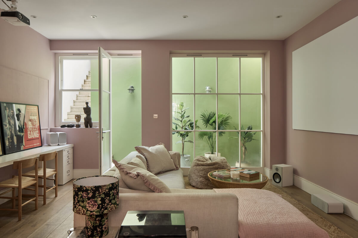Light-Filled Interiors in a Grand Early Victorian House in Notting Hill 14 pink television room with desk